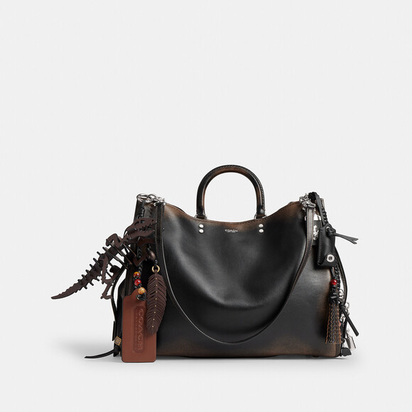 Coach Handbags - Coach Rogue Bag 40 In Loved Leather With Charms